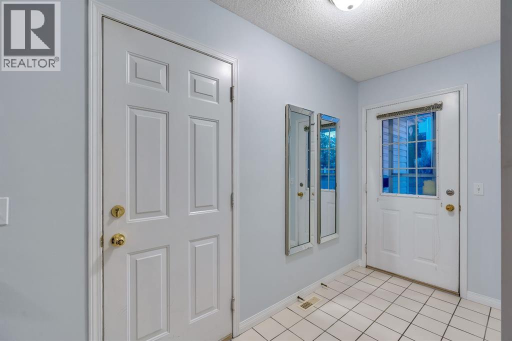 Single Family House 4 Level for Sale in  Kingsland Villas SW Kingsland Calgary 