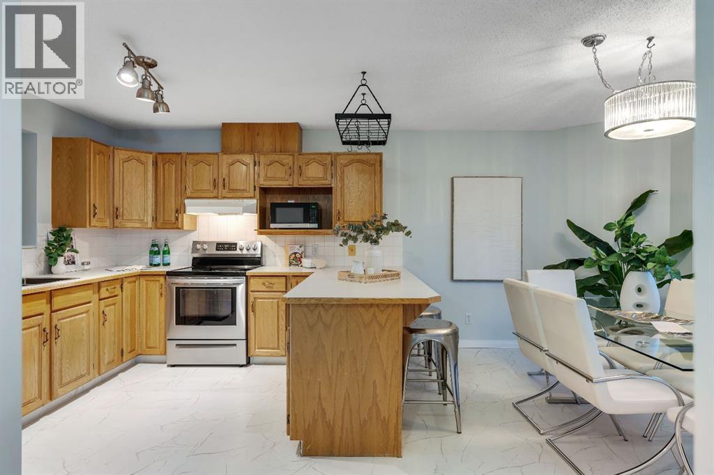Single Family House 4 Level for Sale in  Kingsland Villas SW Kingsland Calgary 