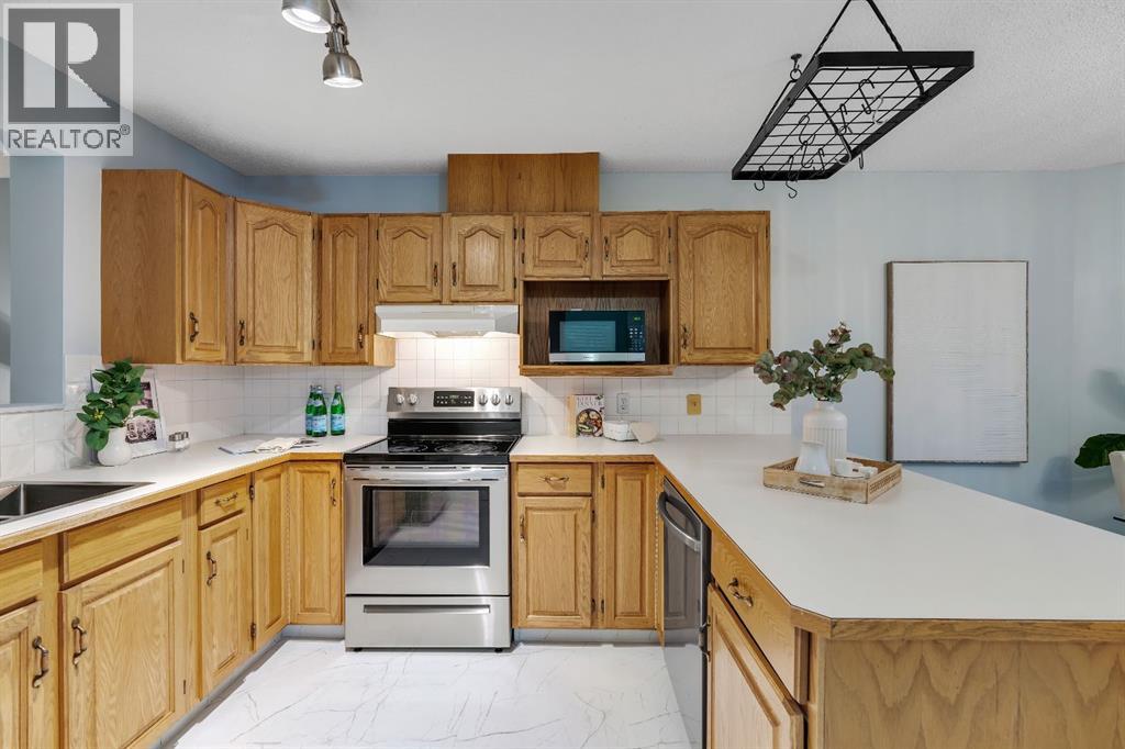 Single Family House 4 Level for Sale in  Kingsland Villas SW Kingsland Calgary 