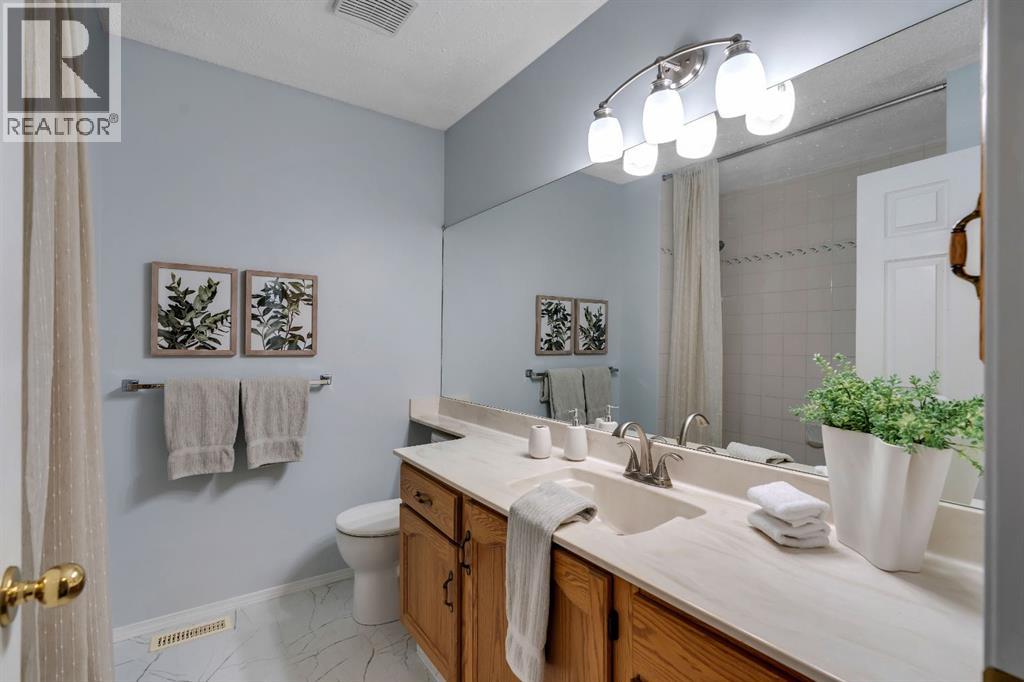Single Family House 4 Level for Sale in  Kingsland Villas SW Kingsland Calgary 