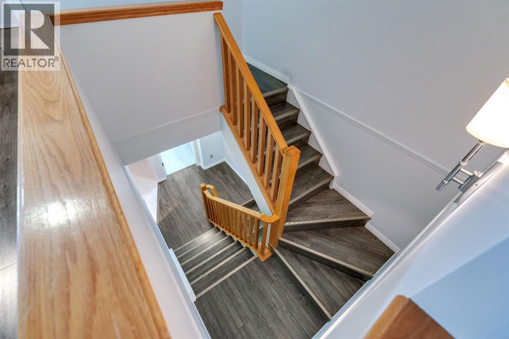 Single Family House 4 Level for Sale in  Kingsland Villas SW Kingsland Calgary 