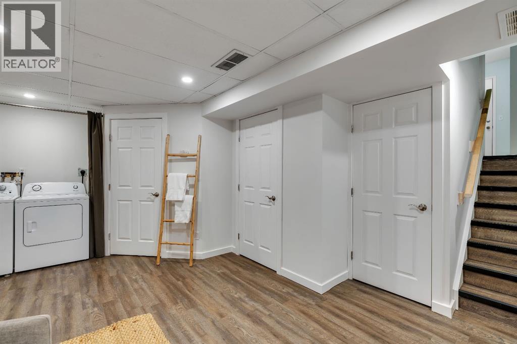 Single Family House 4 Level for Sale in  Kingsland Villas SW Kingsland Calgary 