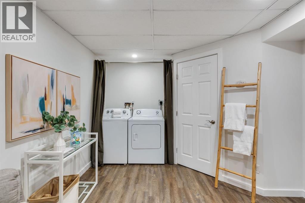 Single Family House 4 Level for Sale in  Kingsland Villas SW Kingsland Calgary 