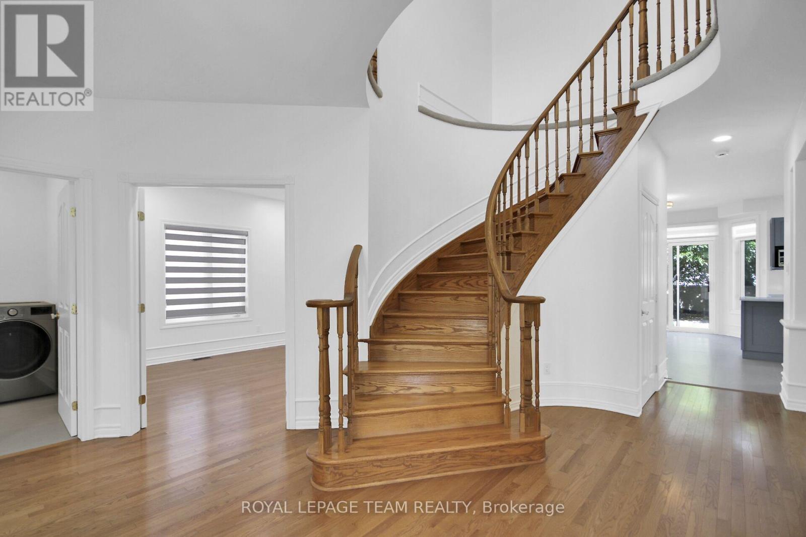 Beautiful curved hardwood staircase