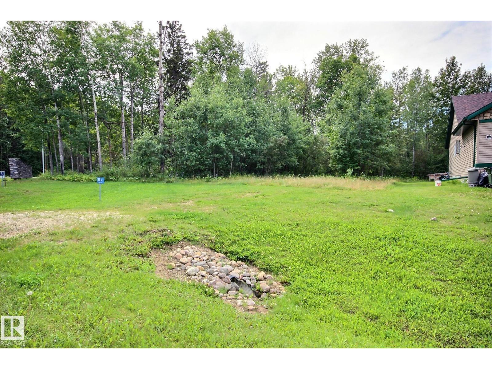 Photo 2 of 2 Poppy Pl, Rural Lac Ste Anne County AB