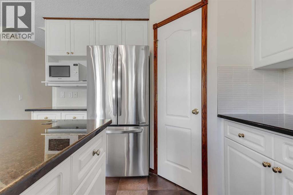 Photo 14 of 62 Arbour Wood Crescent Nw, Calgary AB