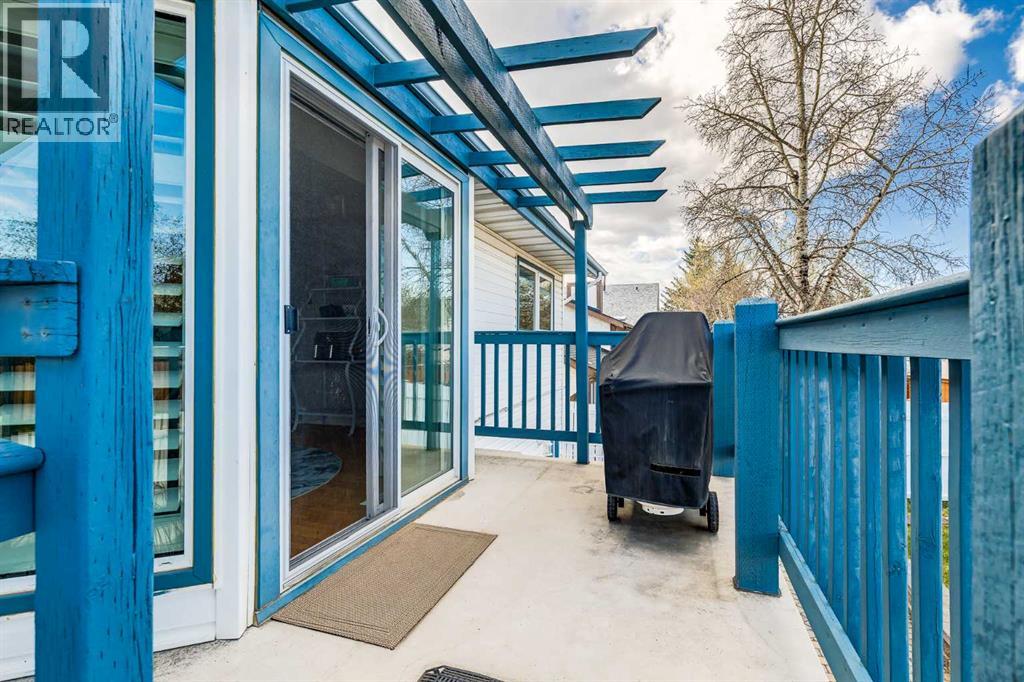 Photo 31 of 31 Woodmont Way Sw, Calgary AB