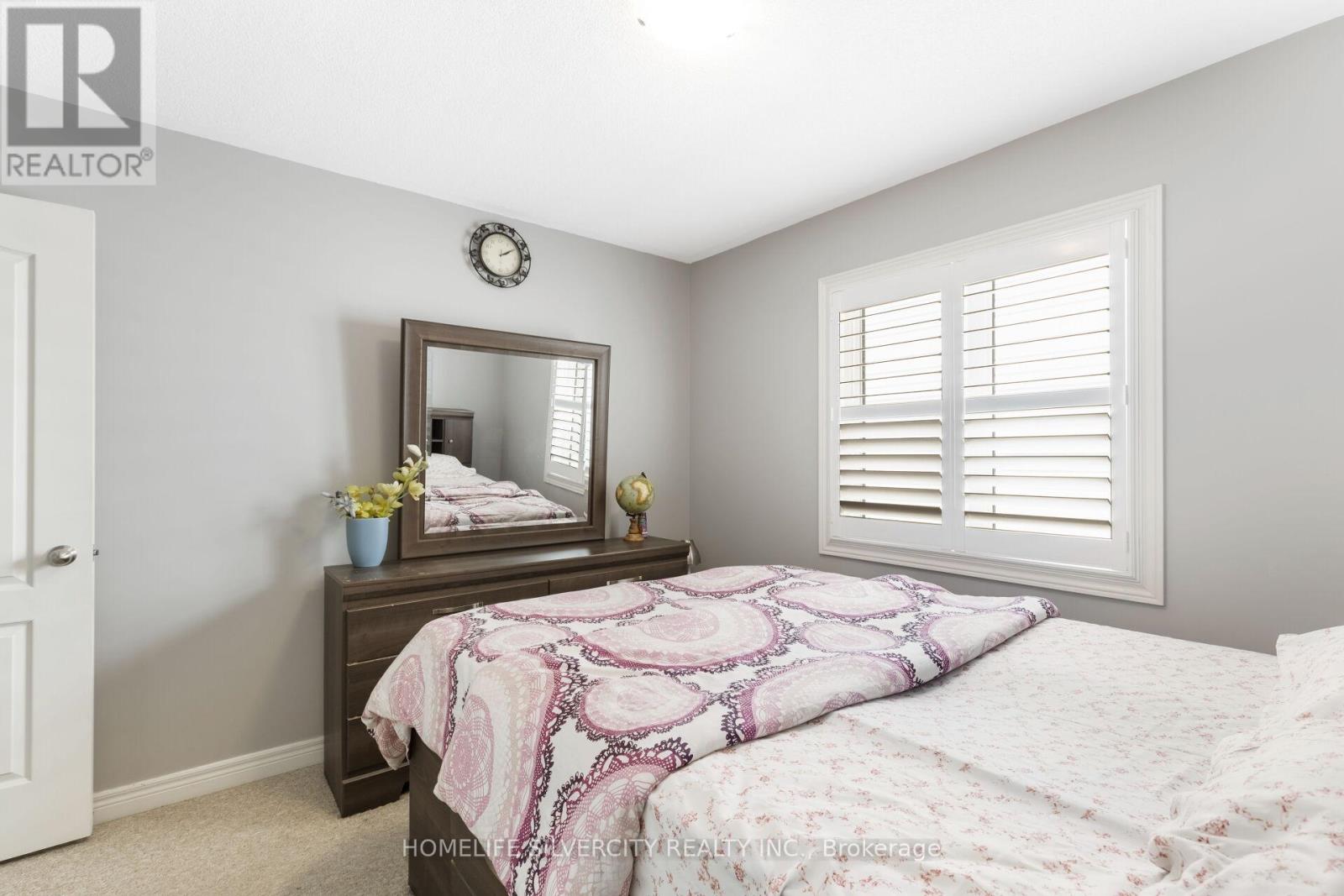 Photo 21 of 411 Windfields Farm Drive W, Oshawa ON