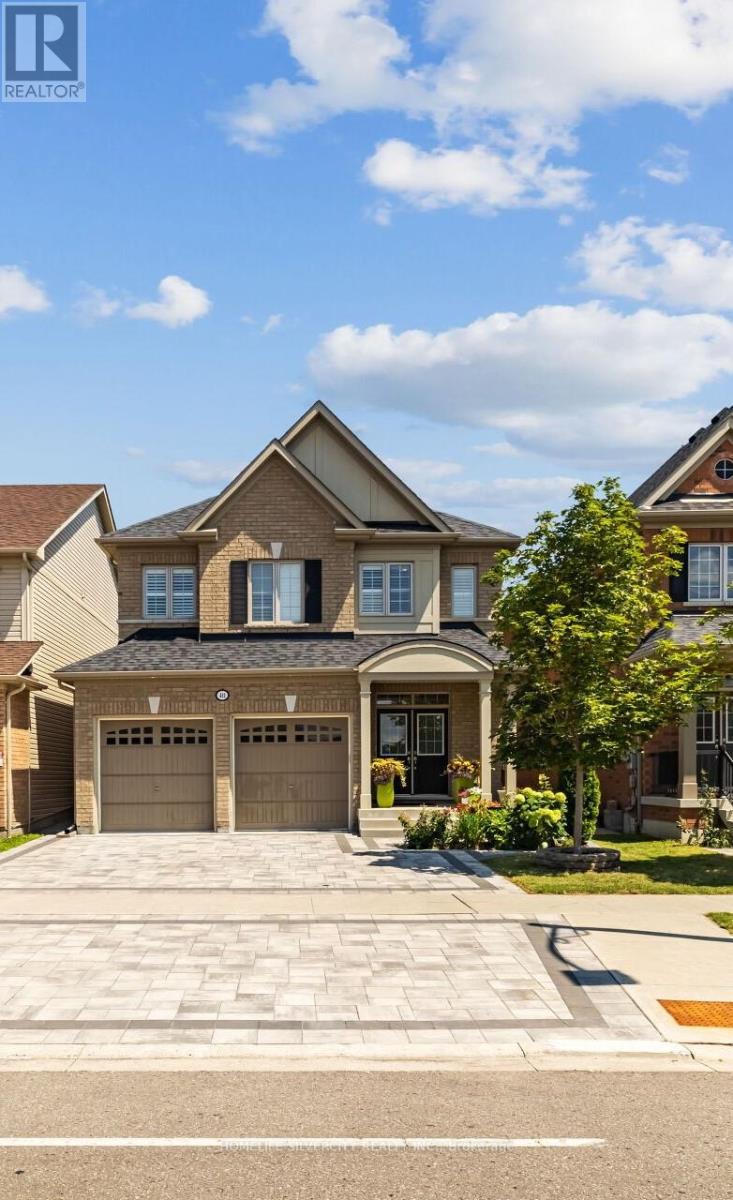 Photo 25 of 411 Windfields Farm Drive W, Oshawa ON