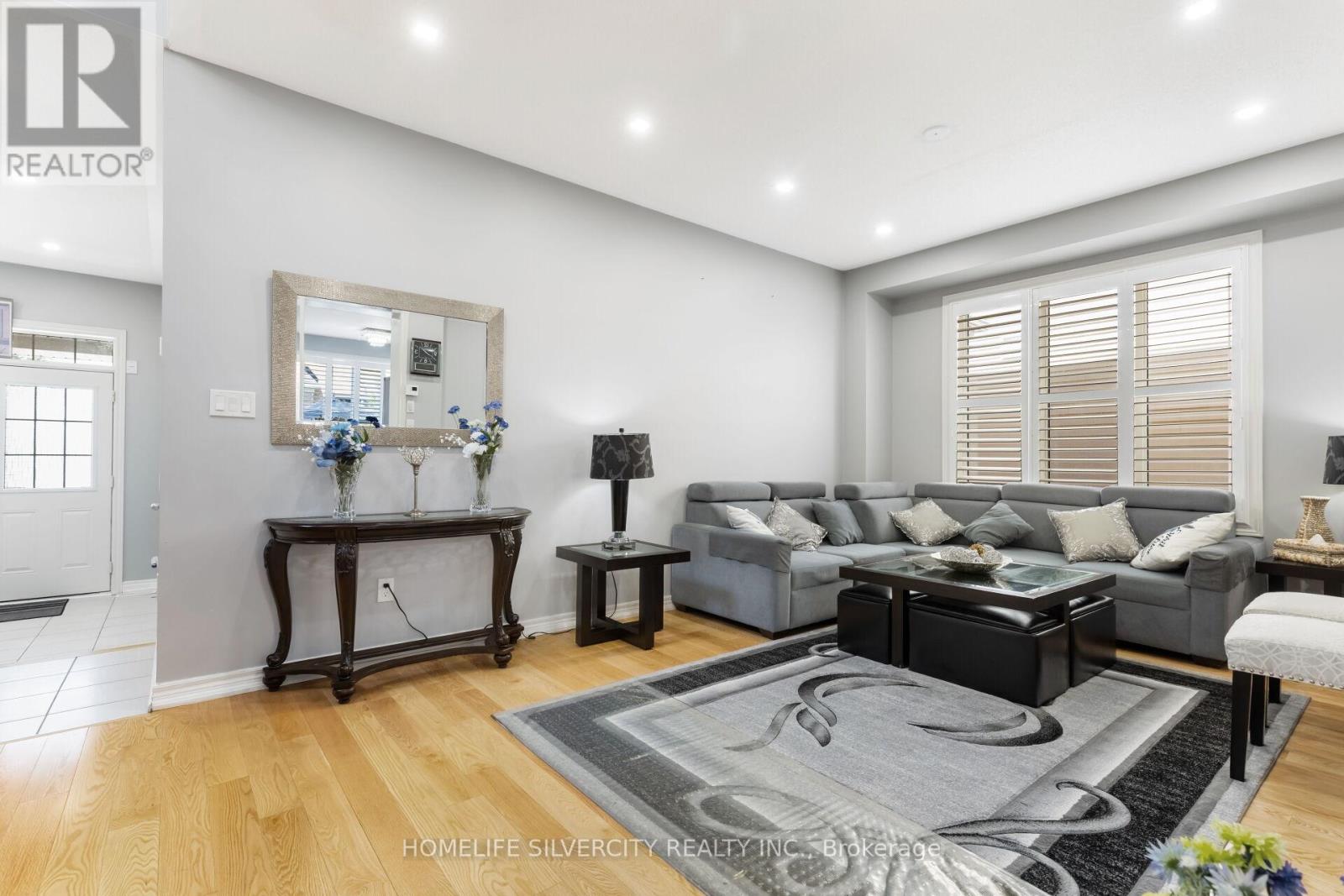 Photo 3 of 411 Windfields Farm Drive W, Oshawa ON
