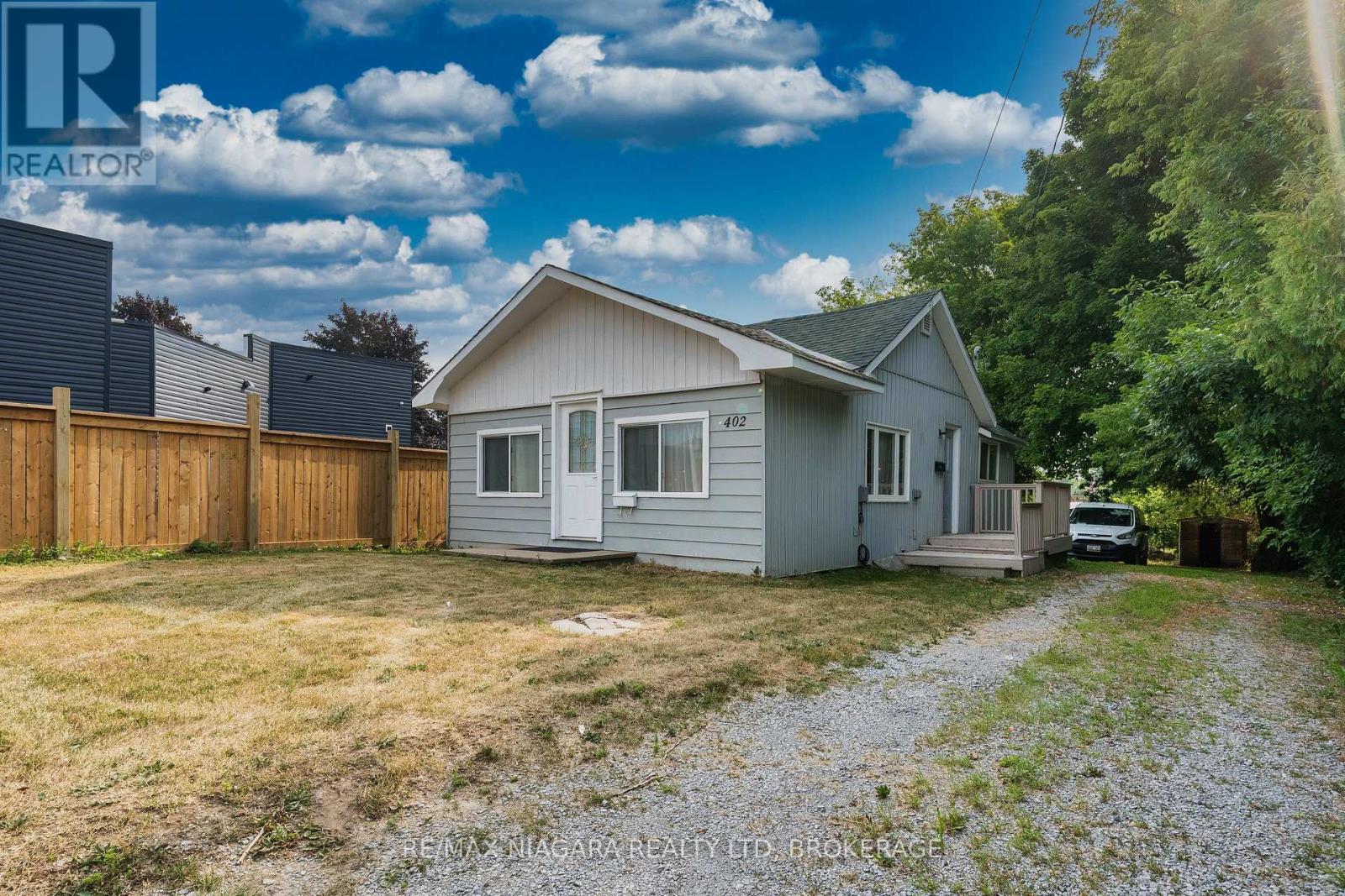 Photo 2 of 402 The Queensway South, Georgina ON