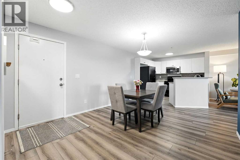 Photo 4 of 7204 304 Mackenzie Way Sw, Airdrie AB