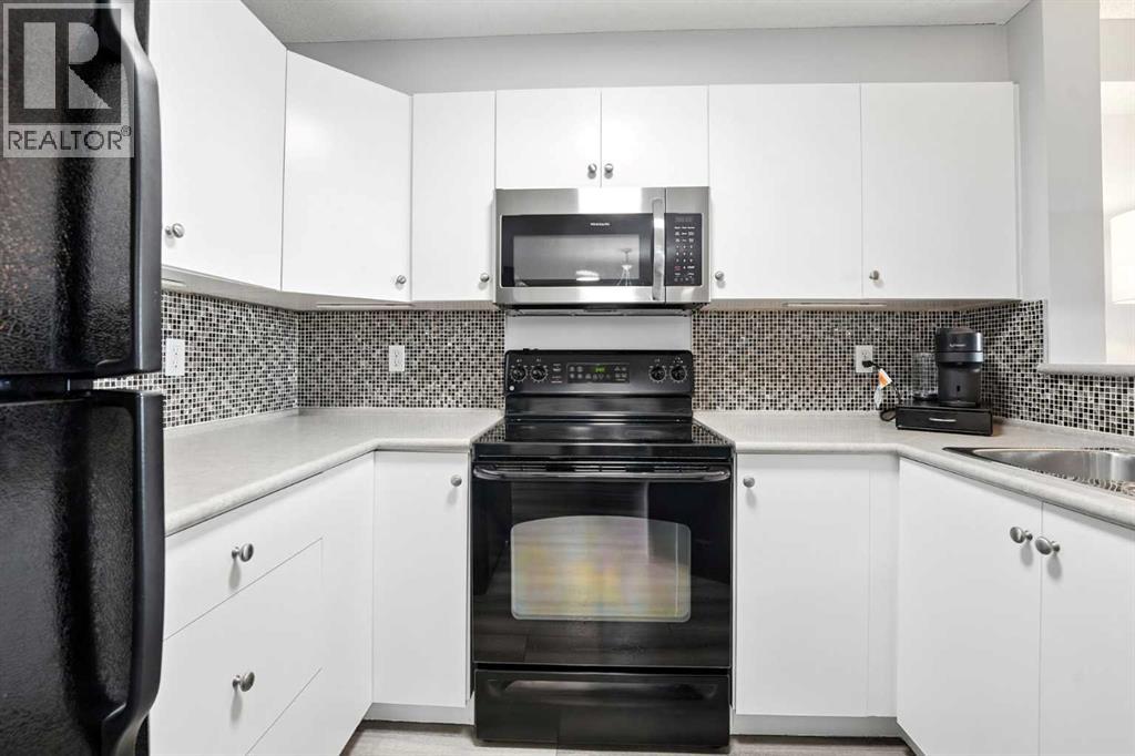 Photo 8 of 7204 304 Mackenzie Way Sw, Airdrie AB