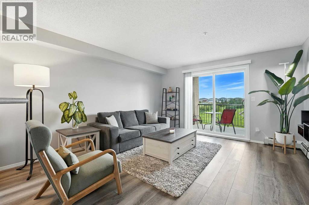 Photo 10 of 7204 304 Mackenzie Way Sw, Airdrie AB