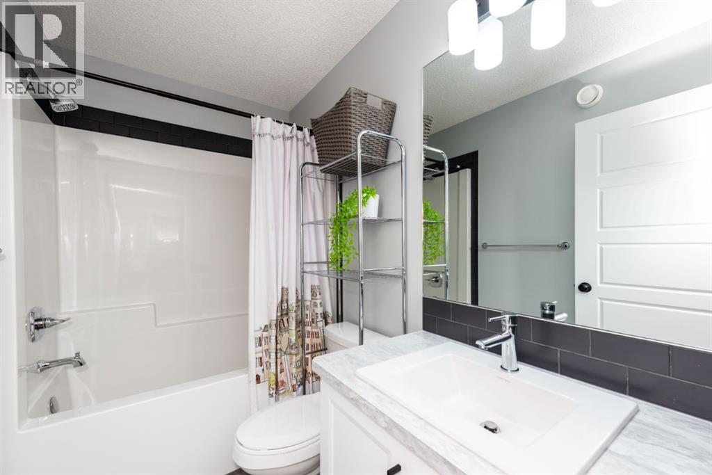 Single Family House for Sale in  Belmont Boulevard SW Belmont Calgary 