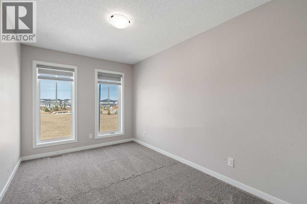 Photo 34 of 234 Carringsby Way Nw, Calgary AB