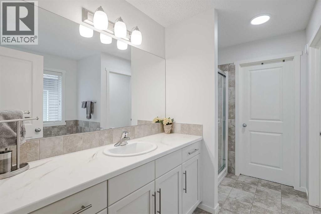 Photo 37 of 225 Kingsmere Cove Se, Airdrie AB