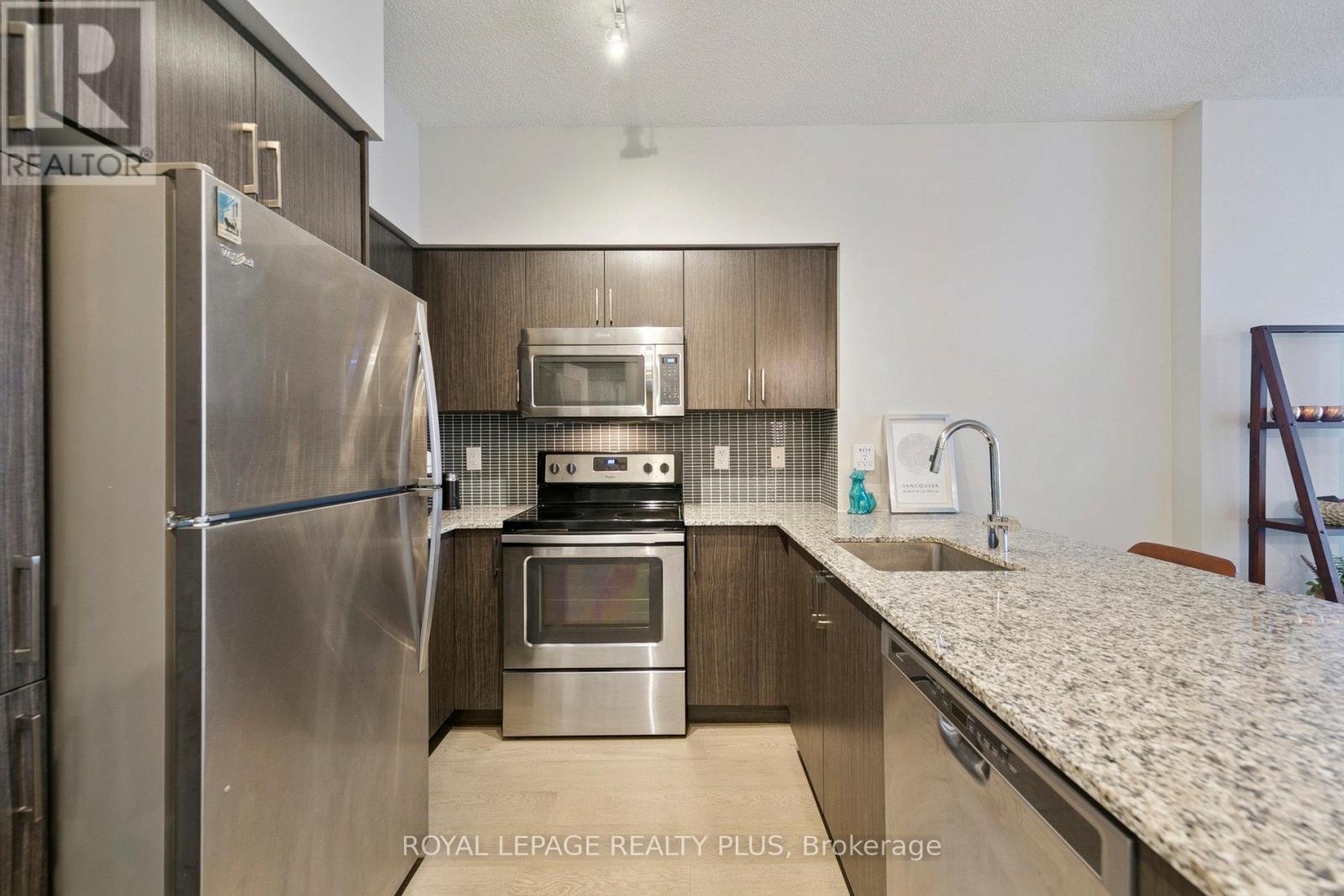 Photo 5 of 406 65 Speers Road, Oakville ON