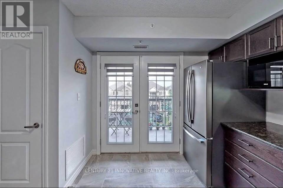 Photo 9 of 309 1450 Main Street, Milton ON