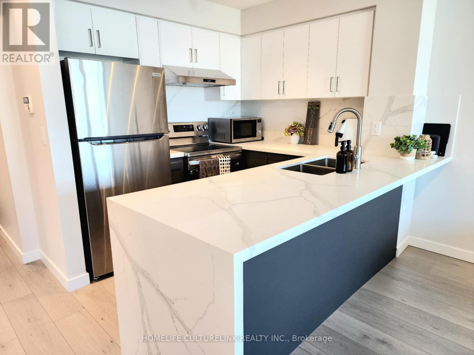 Photo 10 of 305 50 Brian Harrison Way, Toronto ON