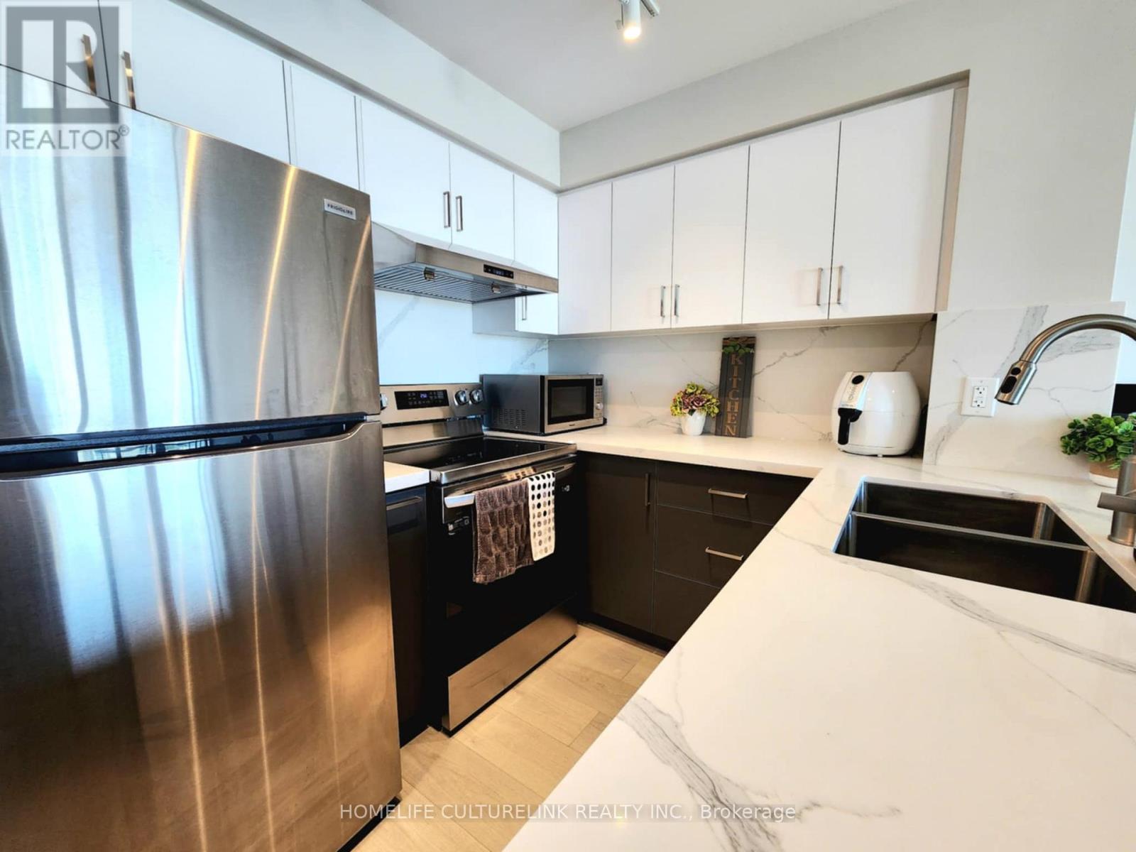 Photo 7 of 305 50 Brian Harrison Way, Toronto ON