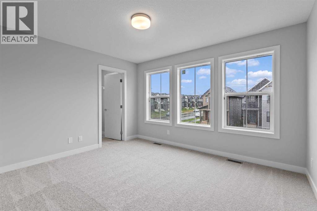 Photo 4 of 1309 South Point Parade Sw, Airdrie AB