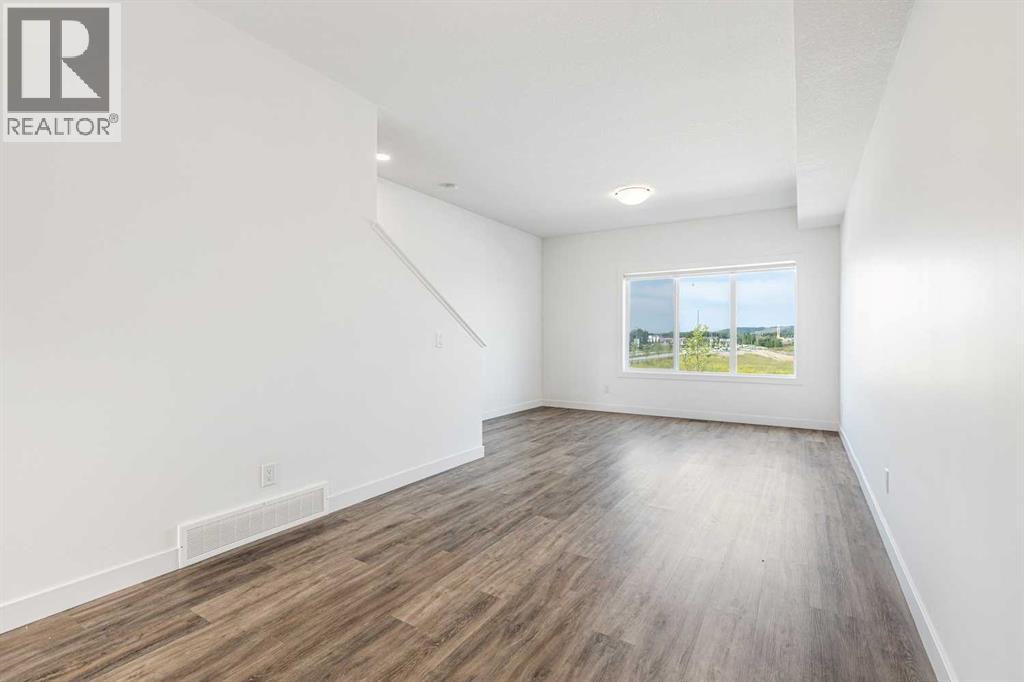 Photo 13 of 1504 24 Rivercrest Drive, Cochrane AB