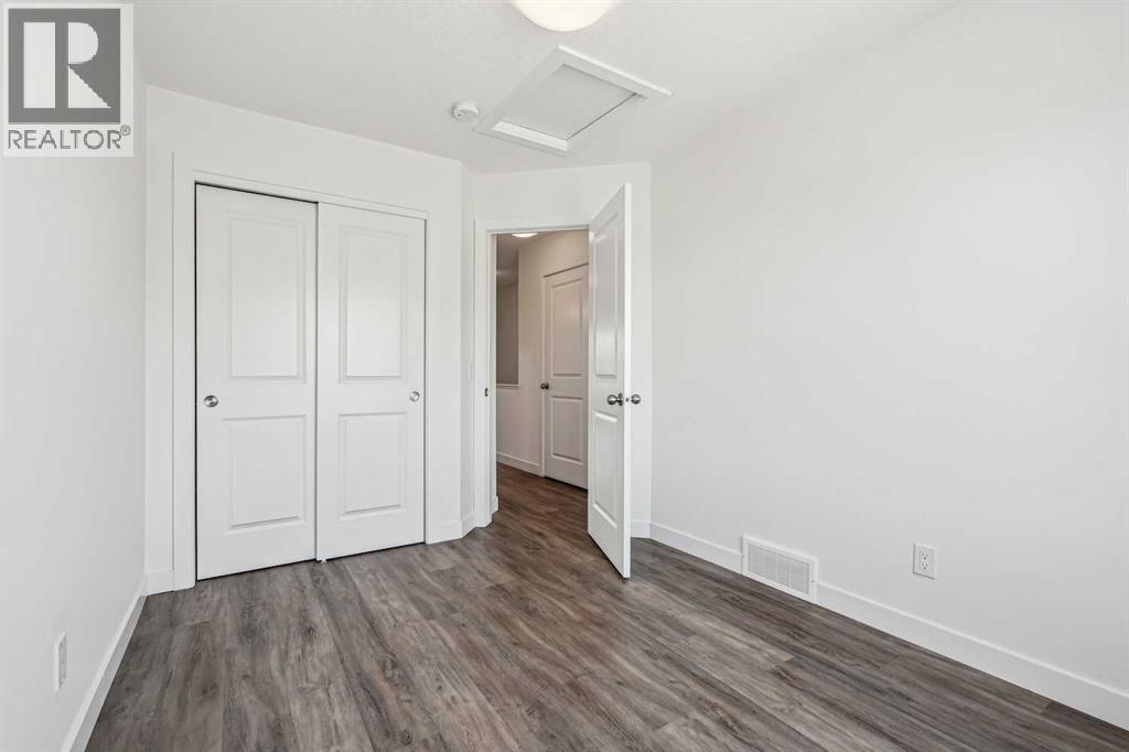 Photo 23 of 1504 24 Rivercrest Drive, Cochrane AB