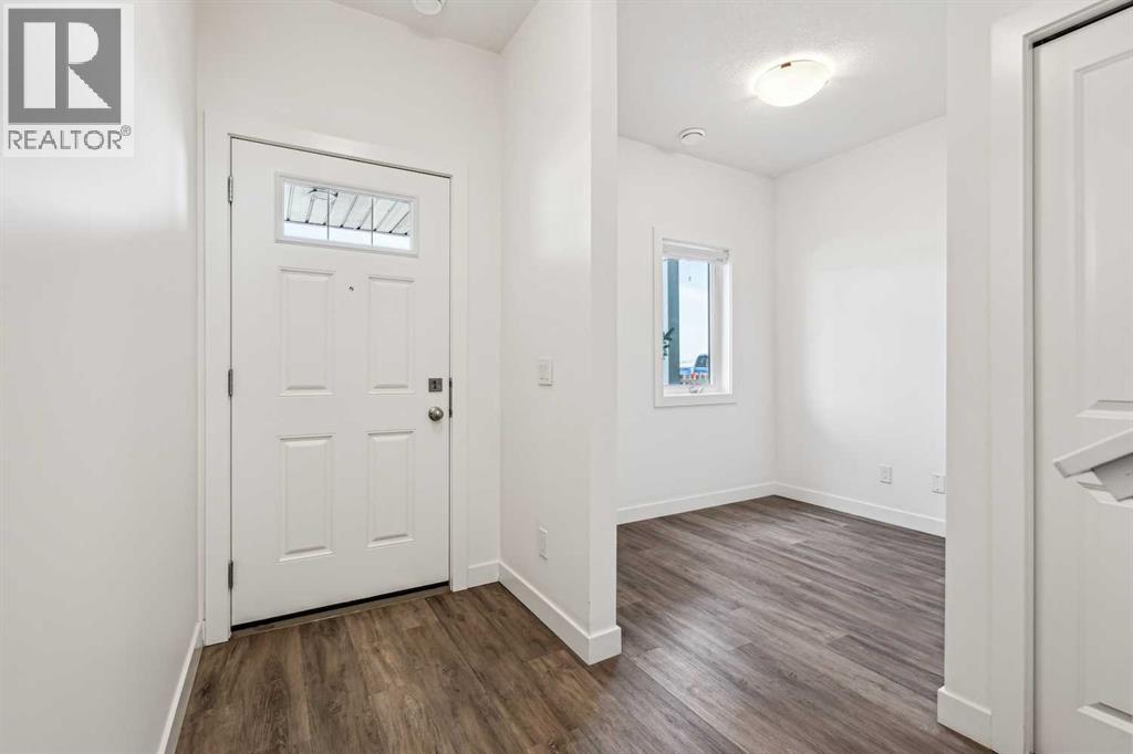 Photo 3 of 1504 24 Rivercrest Drive, Cochrane AB