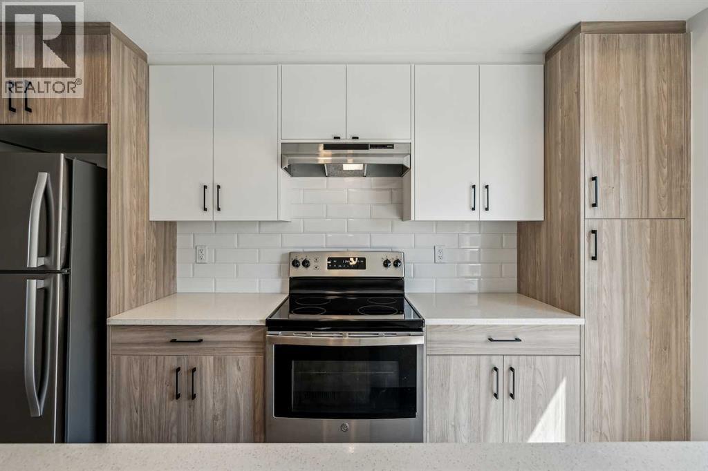 Photo 11 of 1504 24 Rivercrest Drive, Cochrane AB
