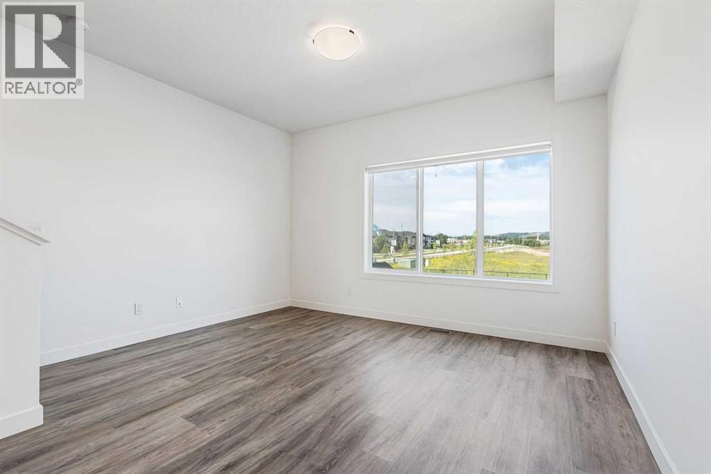 Photo 17 of 1504 24 Rivercrest Drive, Cochrane AB