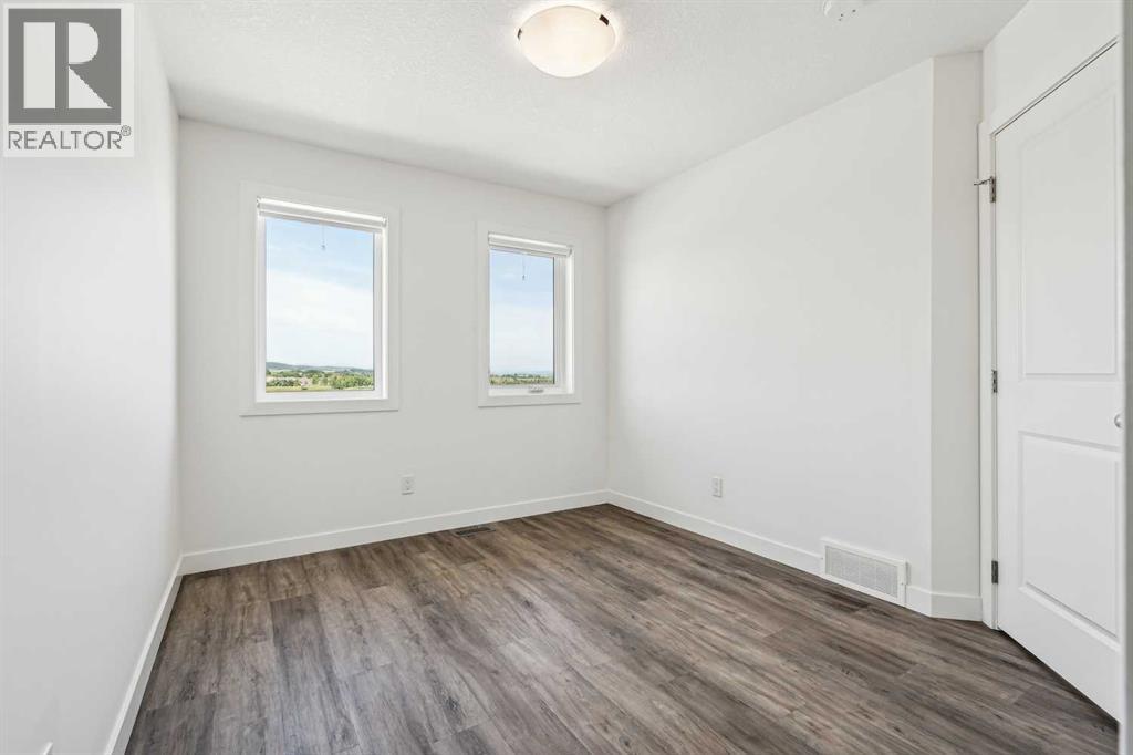Photo 24 of 1504 24 Rivercrest Drive, Cochrane AB