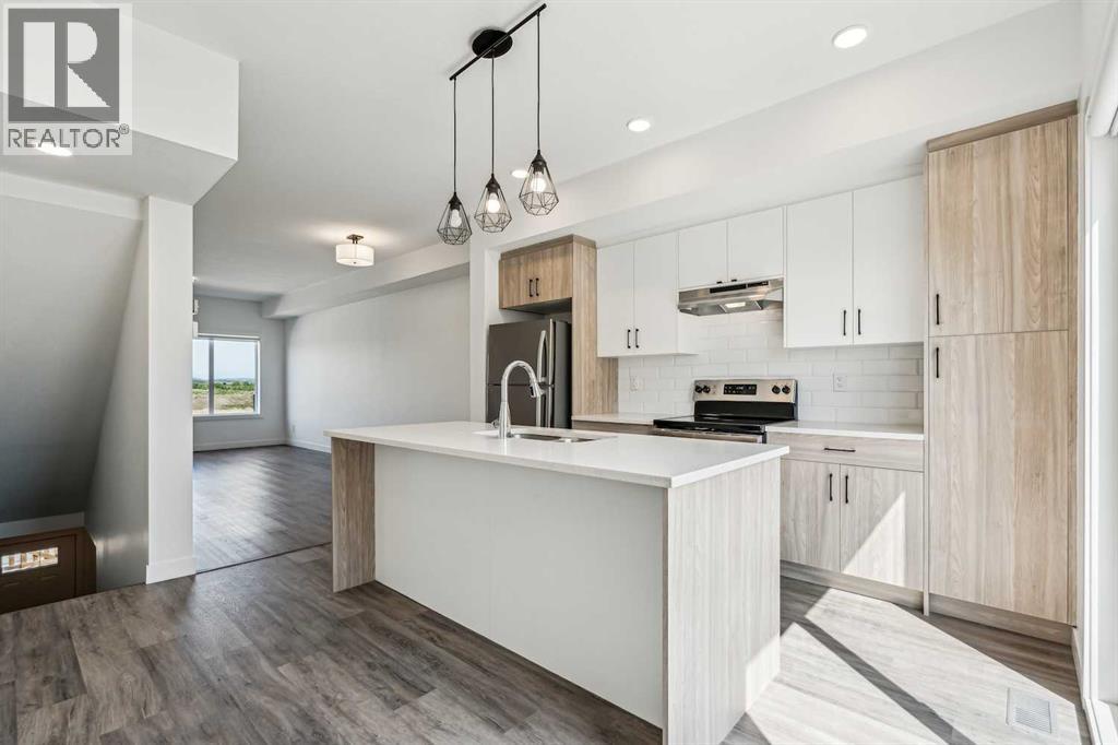 Photo 9 of 1504 24 Rivercrest Drive, Cochrane AB