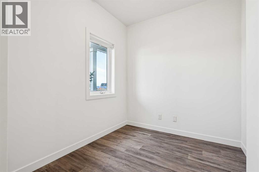 Photo 5 of 1504 24 Rivercrest Drive, Cochrane AB