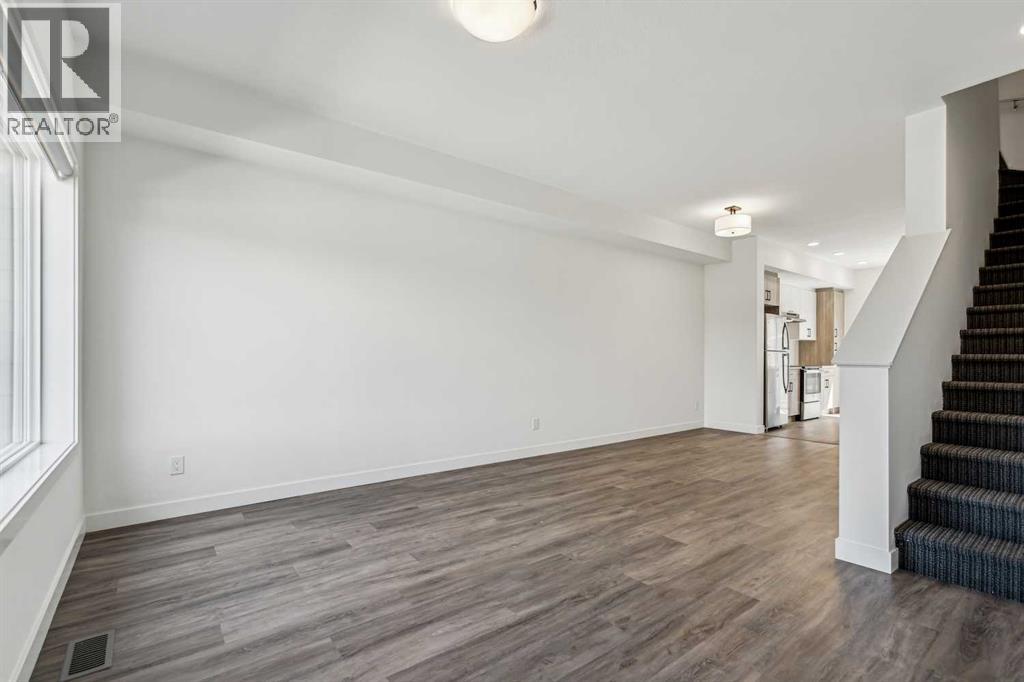 Photo 15 of 1504 24 Rivercrest Drive, Cochrane AB
