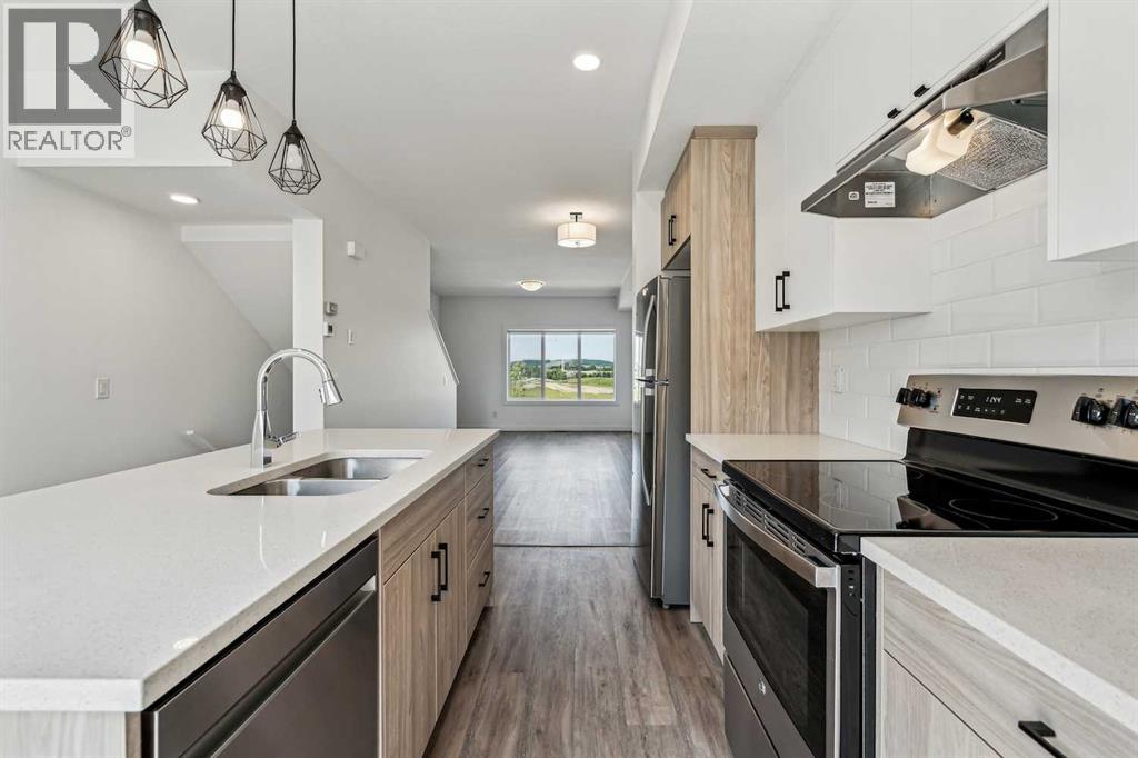 Photo 10 of 1504 24 Rivercrest Drive, Cochrane AB