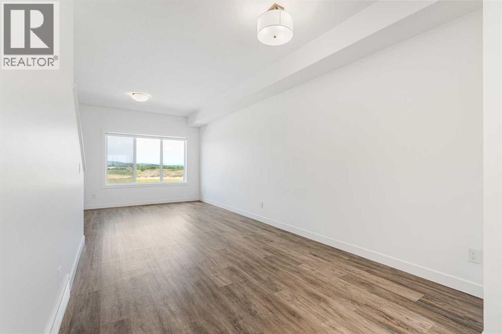Photo 12 of 1504 24 Rivercrest Drive, Cochrane AB
