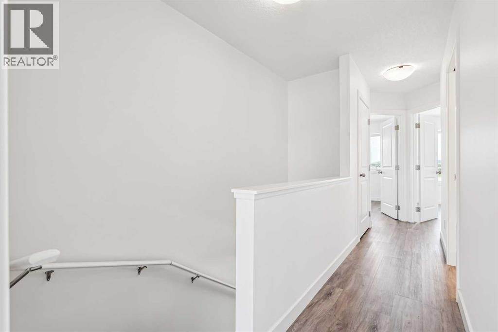 Photo 18 of 1504 24 Rivercrest Drive, Cochrane AB
