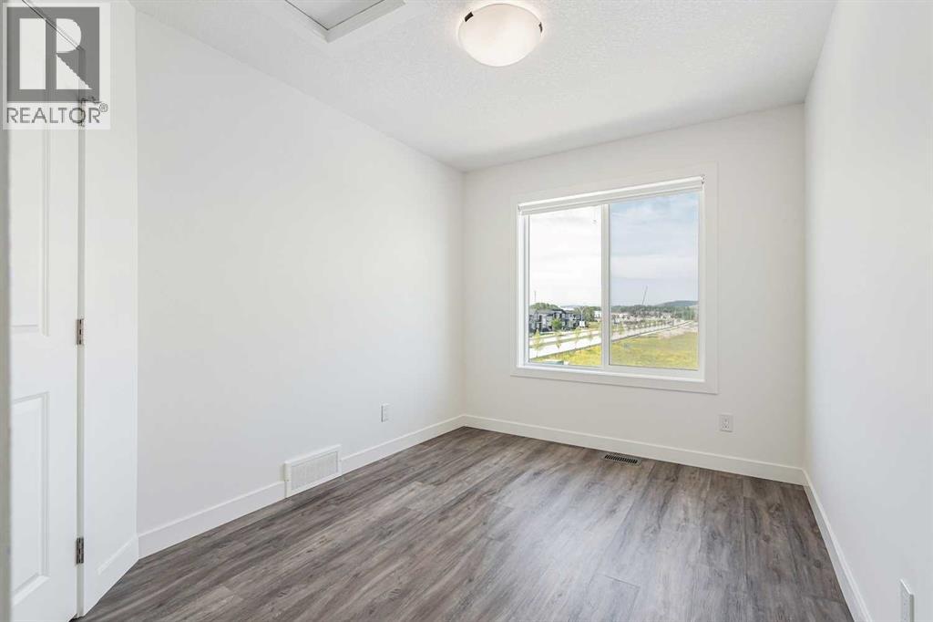 Photo 22 of 1504 24 Rivercrest Drive, Cochrane AB