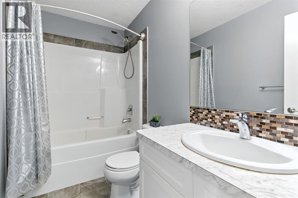 Photo 17 of 313 Kings Heights Drive Se, Airdrie AB