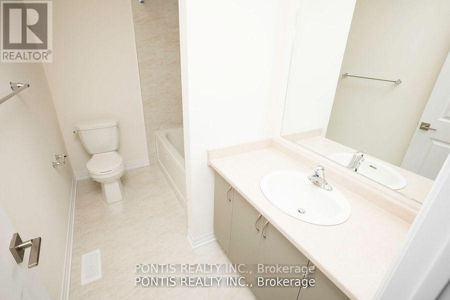 Photo 10 of 84 Fieldridge Crescent, Brampton ON