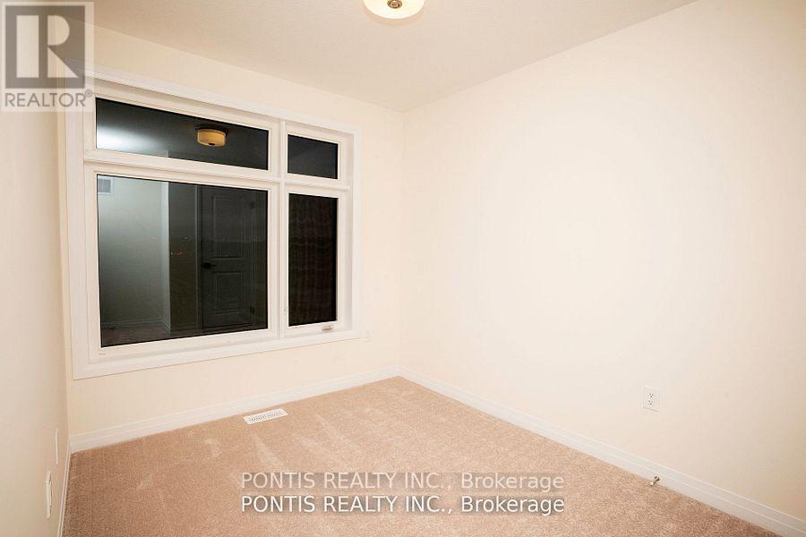 Photo 5 of 84 Fieldridge Crescent, Brampton ON