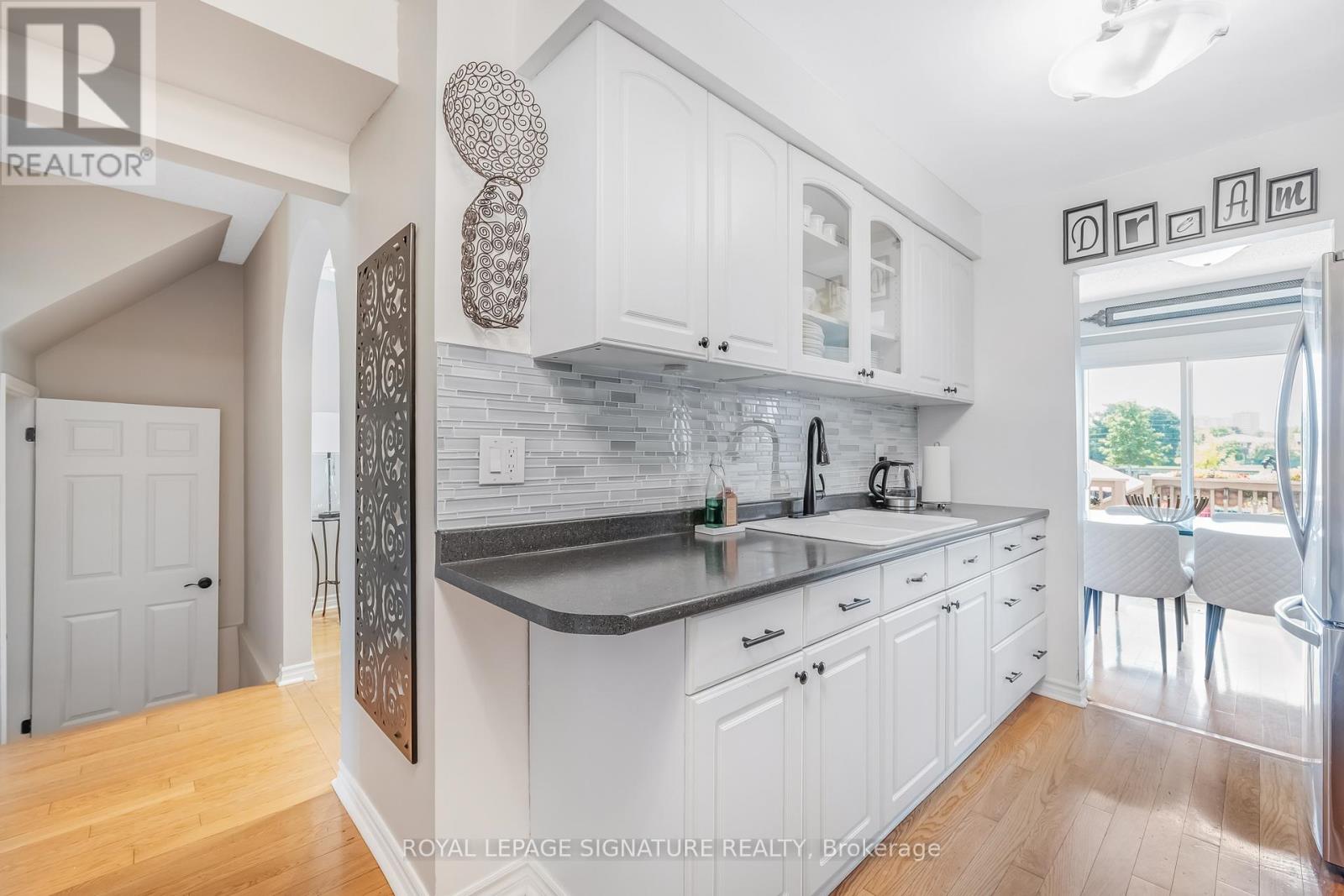 Photo 13 of 66 Springhouse Square, Toronto ON