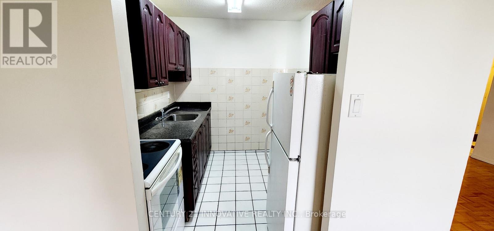 Photo 3 of 405 1950 Kennedy Road, Toronto ON