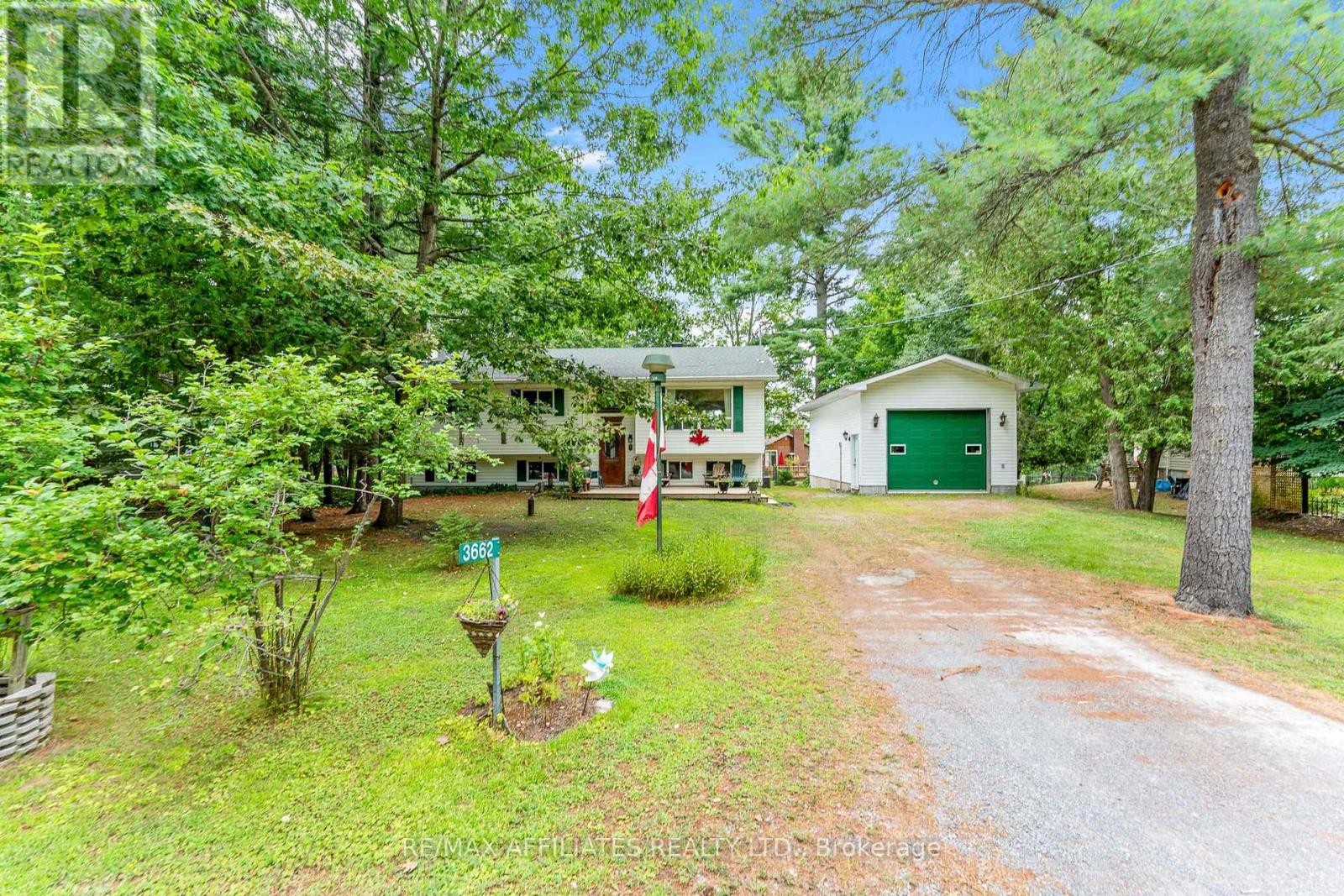 Charming Raised Bungalow w/Oversized Detach Garage