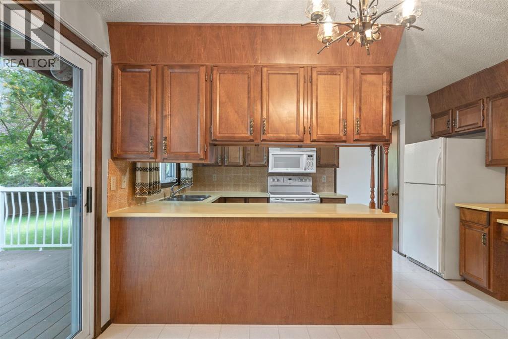 Single Family House for Sale in  Dalcastle Mews NW Dalhousie Calgary 