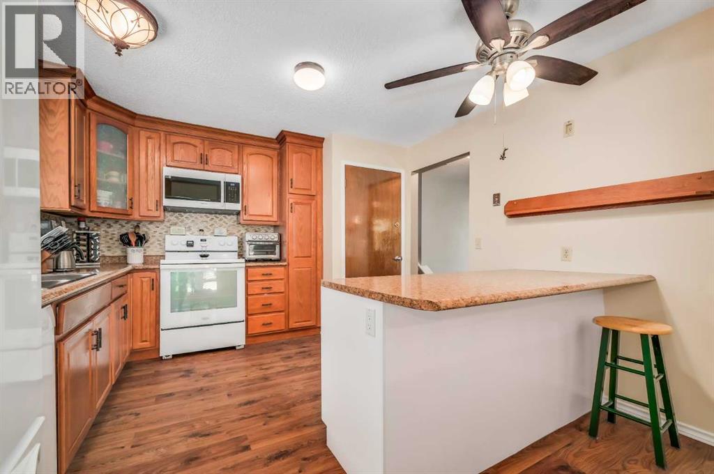 Single Family House 4 Level for Sale in  Macewan Drive NW MacEwan Glen Calgary 