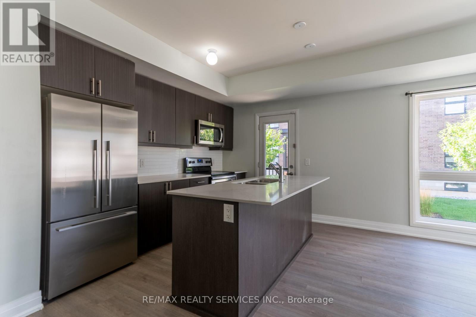 Photo 8 of 105 1208 Main Street E, Milton ON