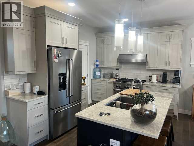 Single Family House for Sale in  A Avenue Westgate Grande Prairie 