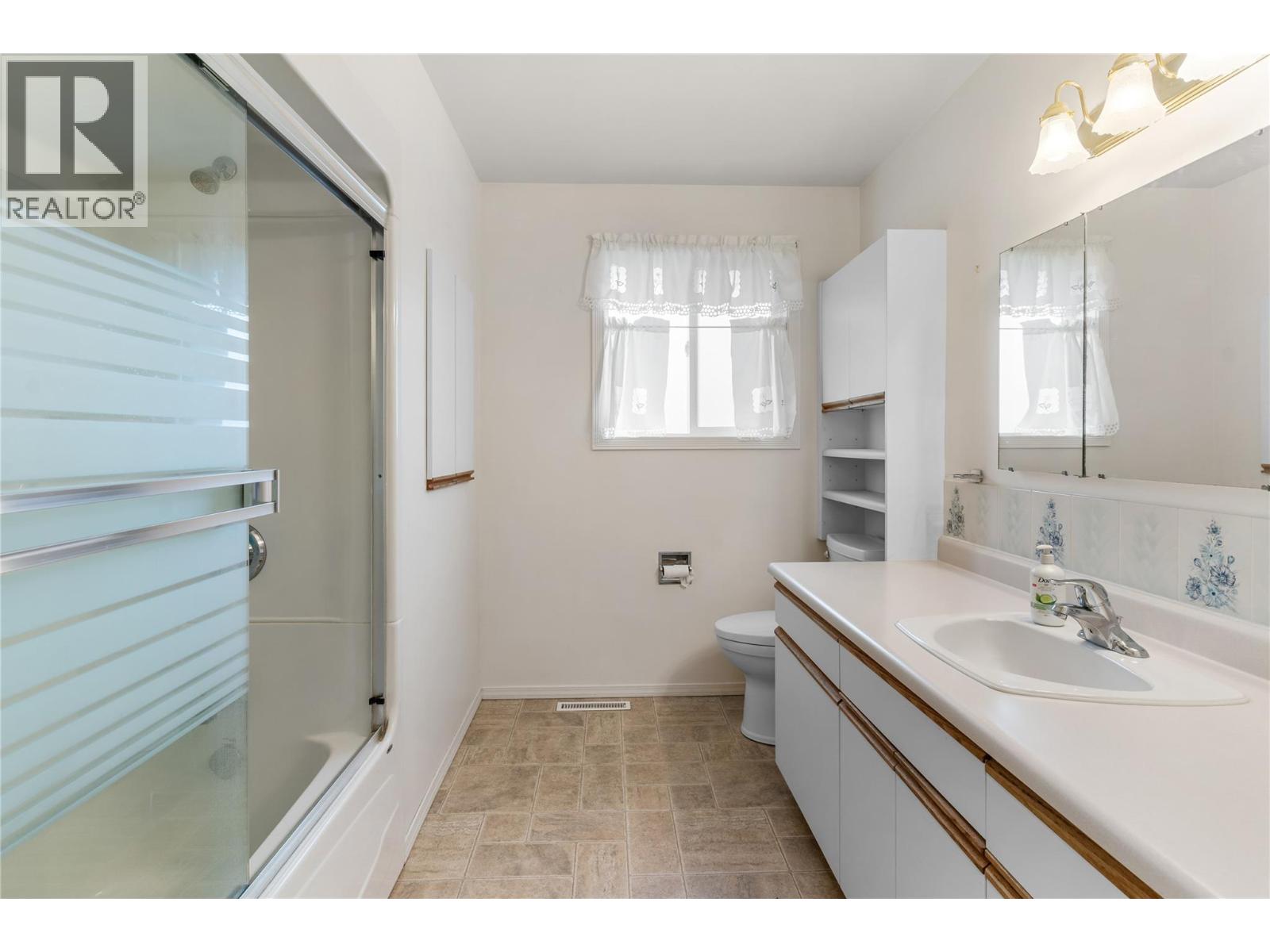 Photo 24 of 1390 Creekside Road, Kelowna BC
